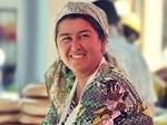 Saleswoman of the Samarkand bread, local market of Samarkand